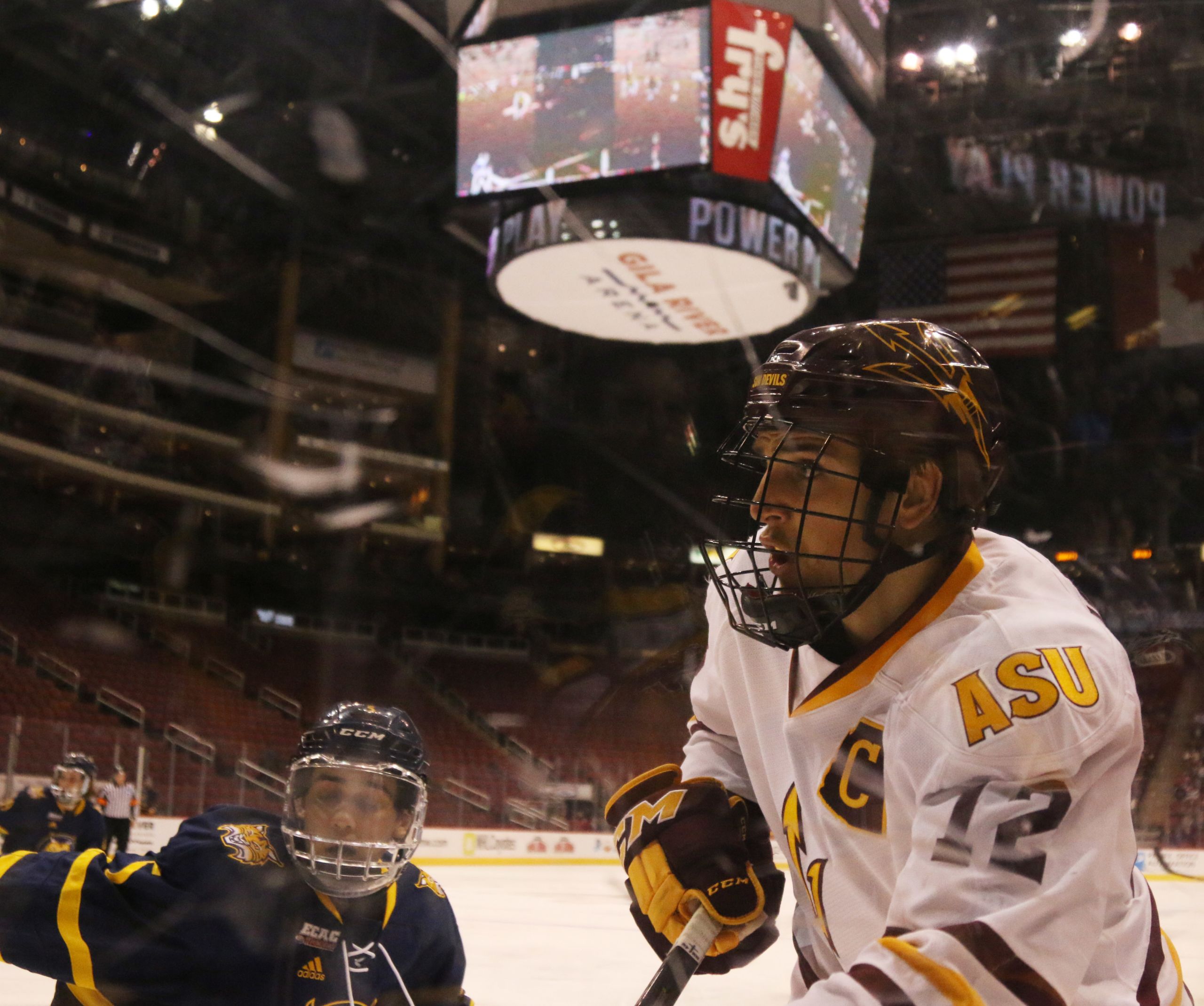 Why College Hockey Requires Players To Wear Full Cages